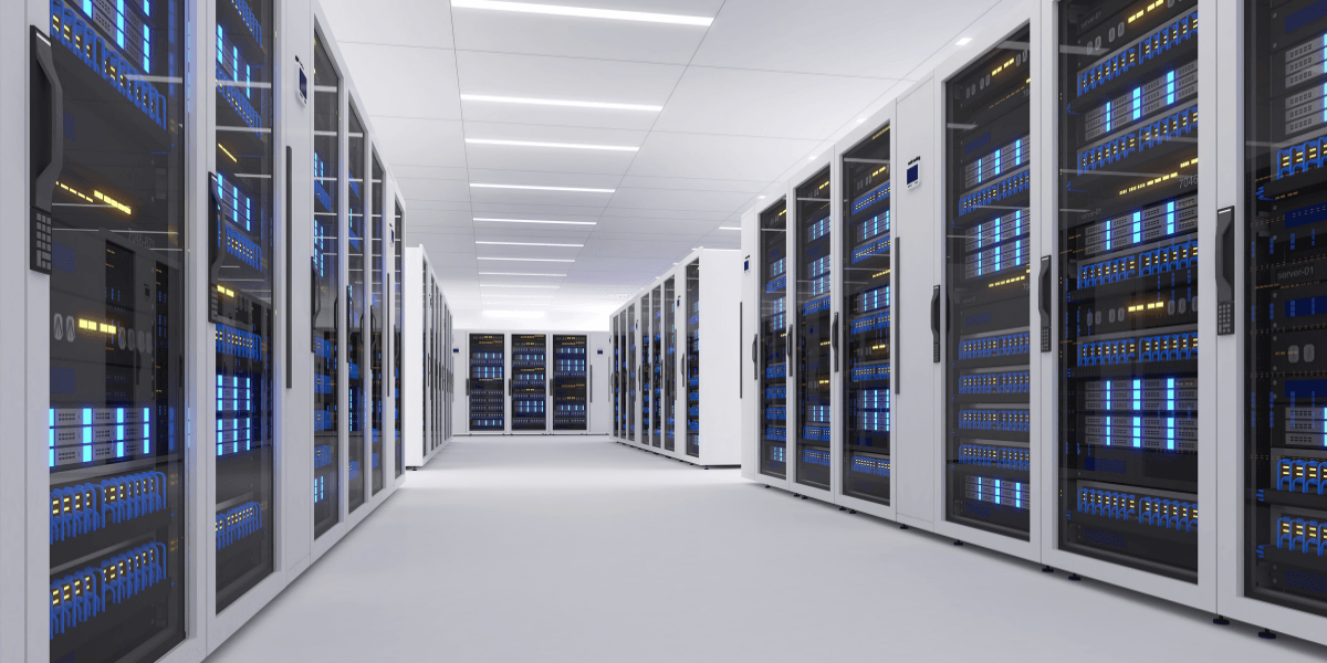 Modern data center aisle with rows of server racks and illuminated panels