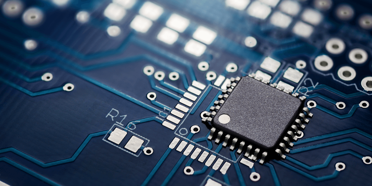 Close-up of a semiconductor chip mounted on a printed circuit board.