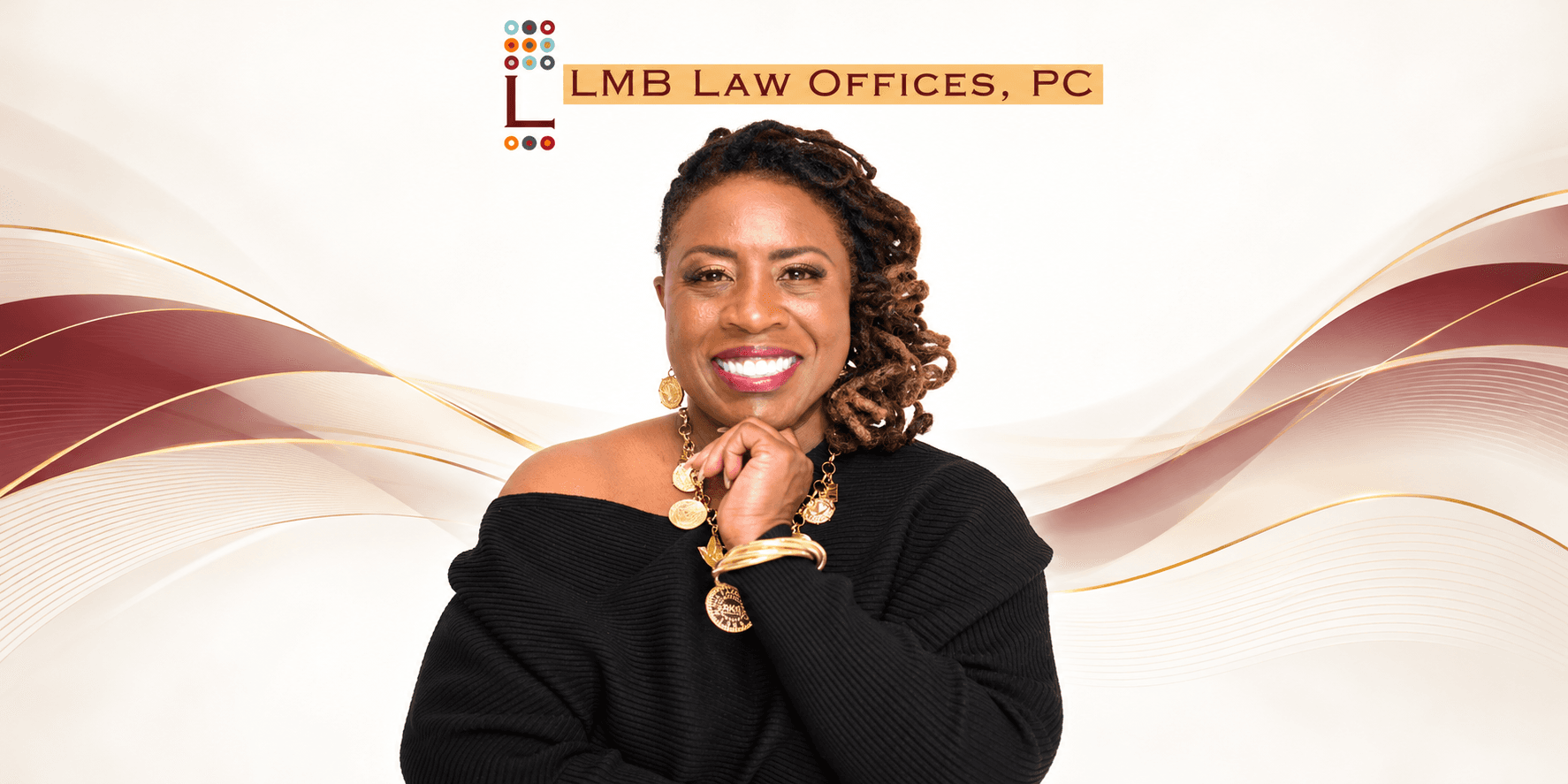 Smiling woman in black attire posing with arms crossed beside LMB Law Offices logo