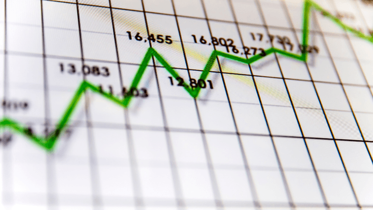 Green upward-trending line graph showing corporate earnings and financial market performance.