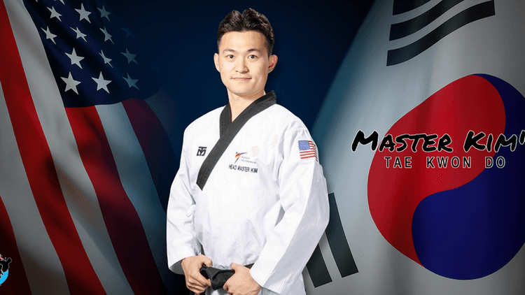 Master Kim in taekwondo uniform with U.S. and South Korean flags, promoting Master Kim’s Tae Kwon Do - Meridian