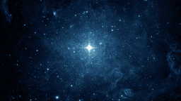 Vast blue starfield with bright stars and nebulae scattered throughout the cosmos