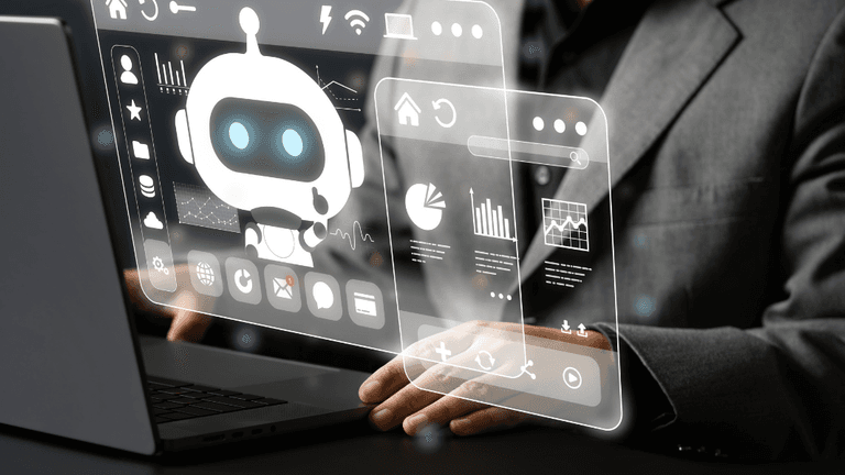 Person in a suit interacts with a holographic chatbot interface above a laptop