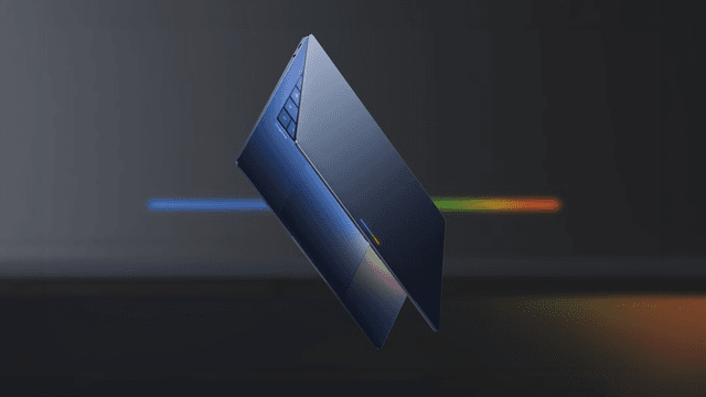 A sleek, blue laptop is shown floating against a dark background with colorful lines.