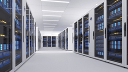 Modern data center aisle with rows of server racks and illuminated panels