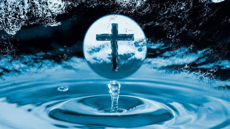 A symbolic image of faith, featuring a cross in a water droplet, representing spiritual transformation.