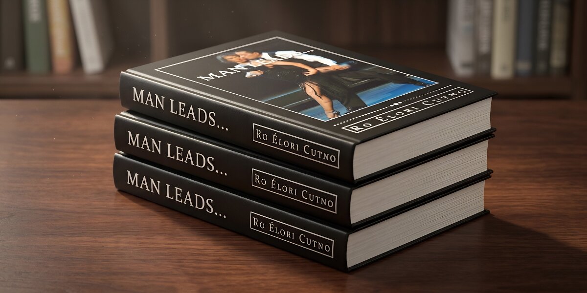 Three hardcover books stacked on a wooden table. They have black covers with the title "MAN LEADS..." and the author's name, Ro Élori Cutno. A blurred bookshelf is in the background.
